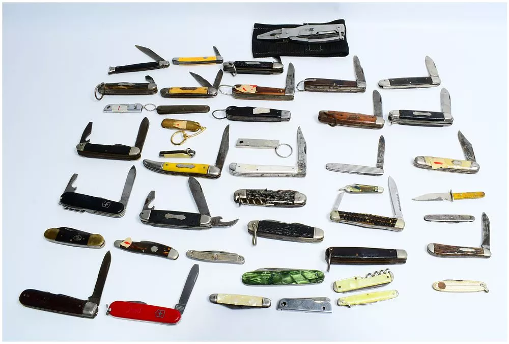 Approximately Forty Assorted Vintage and Modern Folding Pocket Knives, including Schrade, with One Gerber Multiplier Pro-XL Multi-Tool