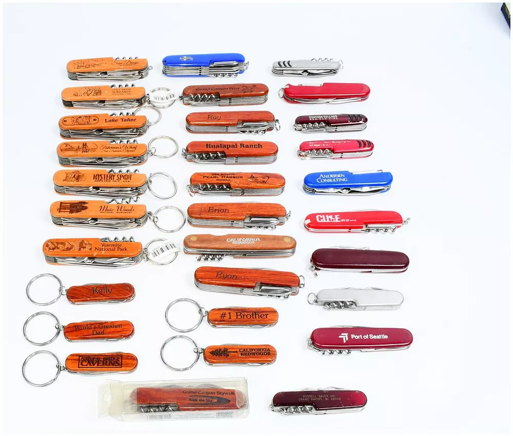 A Collection of Approximately 40 'Swiss Army Style' Multi-Tool Pocket Knives, Likely TSA Confiscated