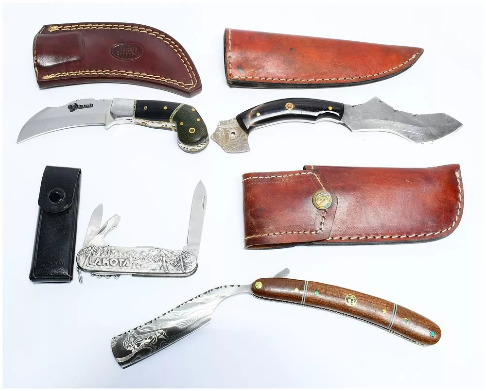 A Collection of Bladed Instruments and Sheaths