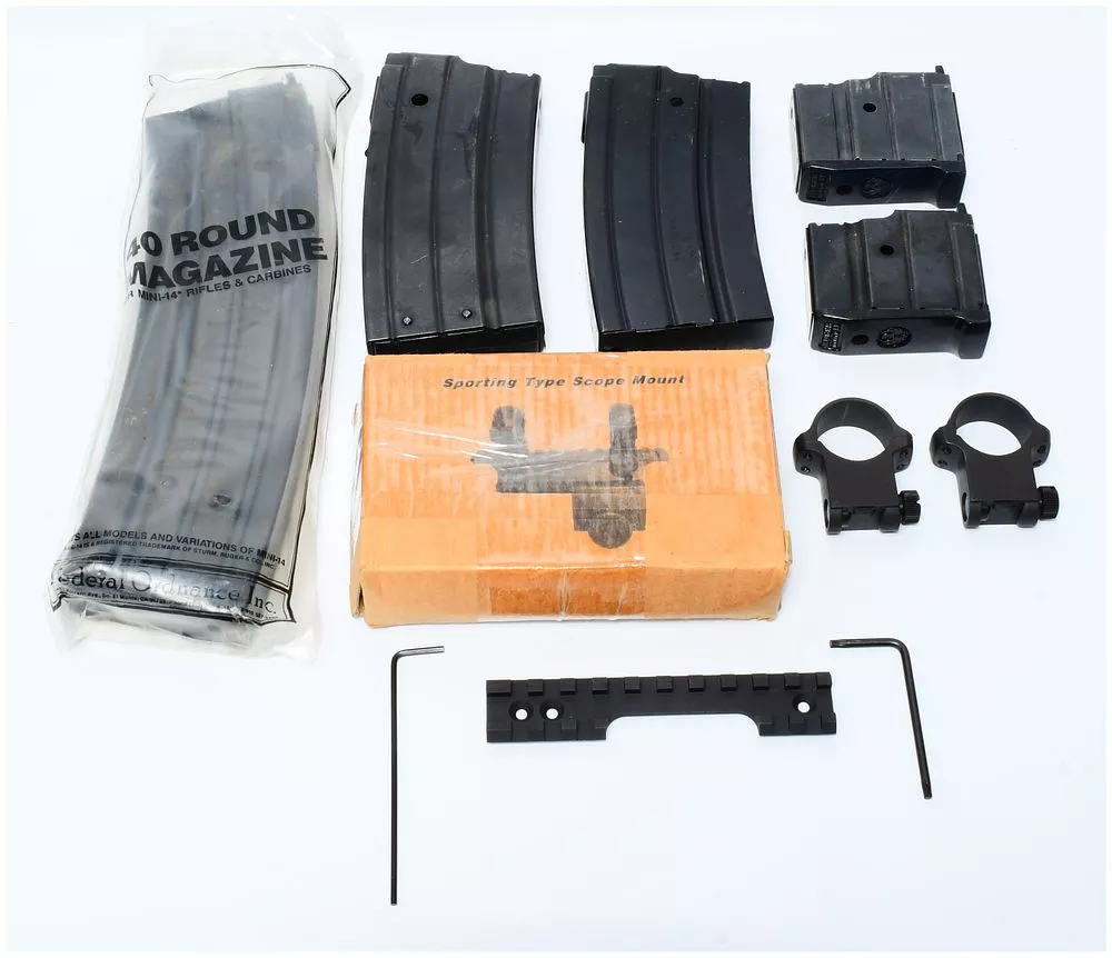 A Collection of Federal Ordnance Inc. Mini-14 Magazines and Firearm Accessories