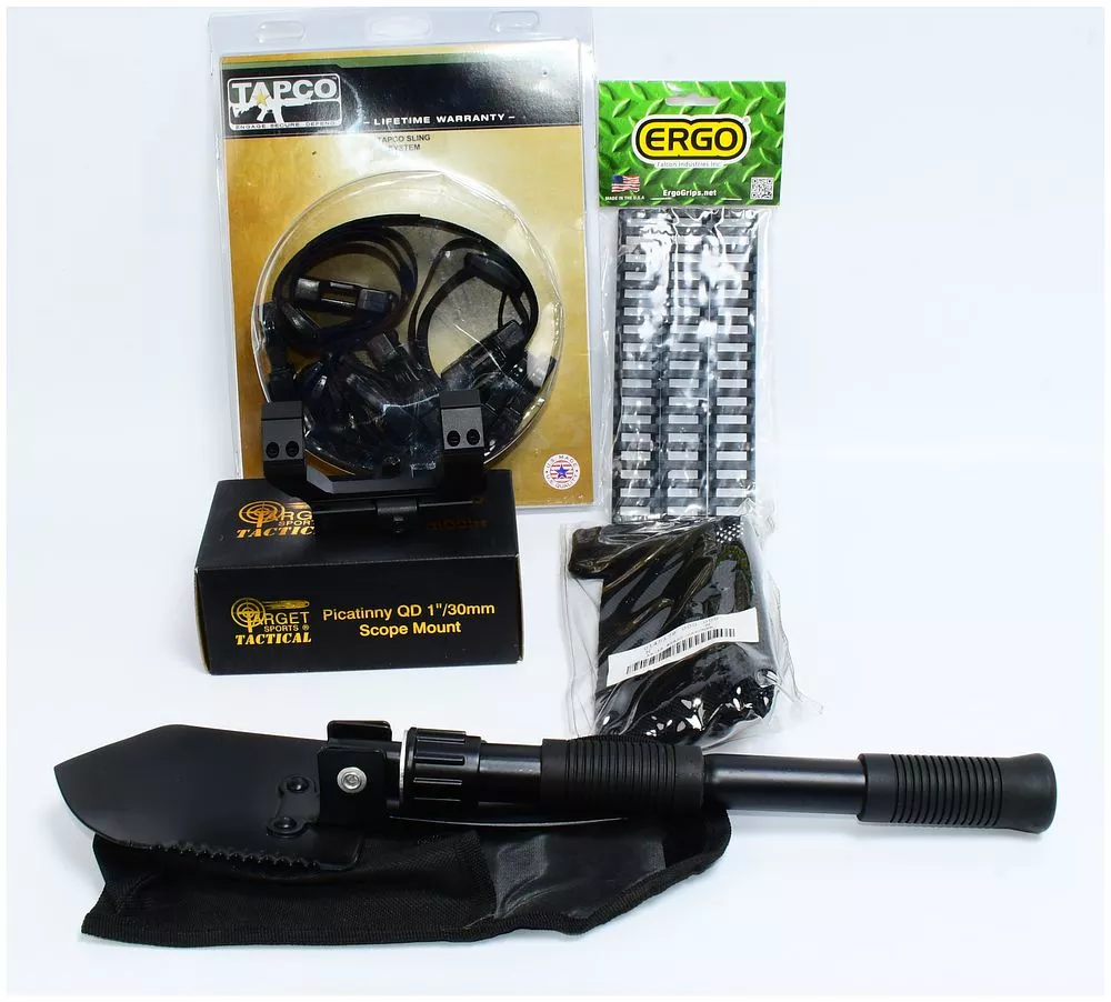 A Collection of Modern Tactical and Outdoor Equipment, including TAPCO Sling, ERGO Rail Covers, TARGET SPORTS TACTICAL Scope Mount, and a Folding Entrenching Tool