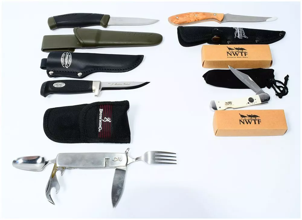 A Collection of Six Contemporary Hunting and Outdoor Tools, including Moraknil, J. Marttiini, NWTF, and Browning