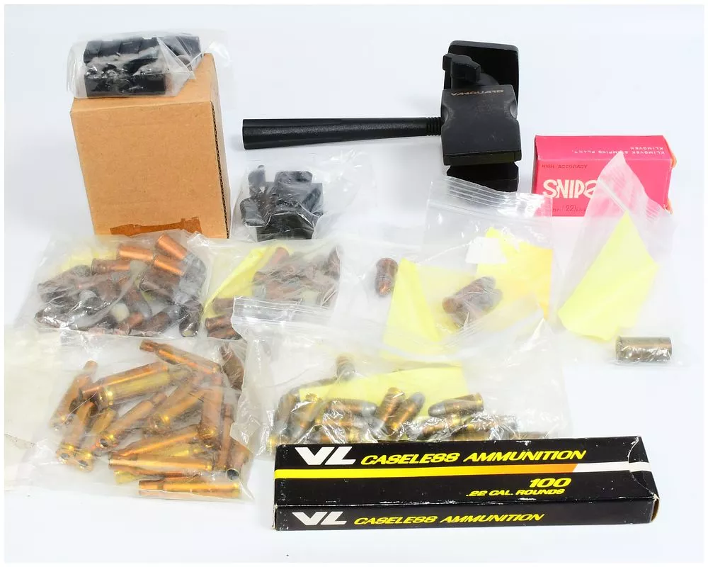 A Collection of VL Caseless and Klimovsk Sniper .22 Caliber Ammunition, Reloading Components, and a Vanguard Shooting Accessory