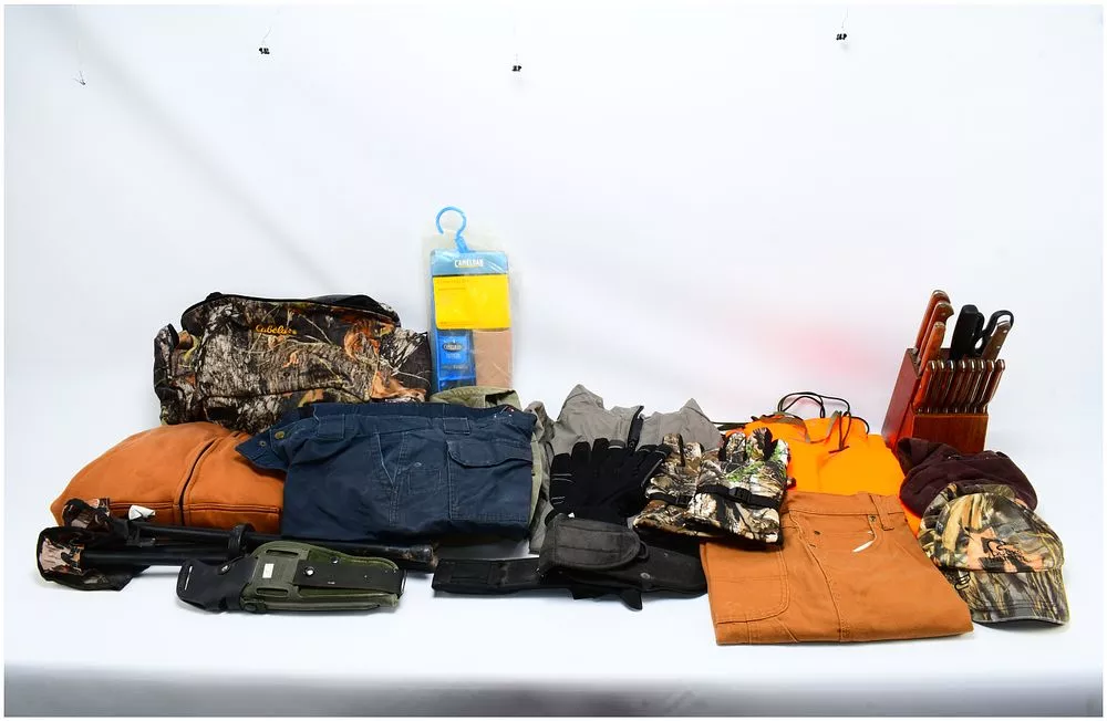 A Group of Contemporary Outdoor and Hunting Gear, including a Cabela's Mossy Oak Backpack and a New Camelbak Hydration Pack