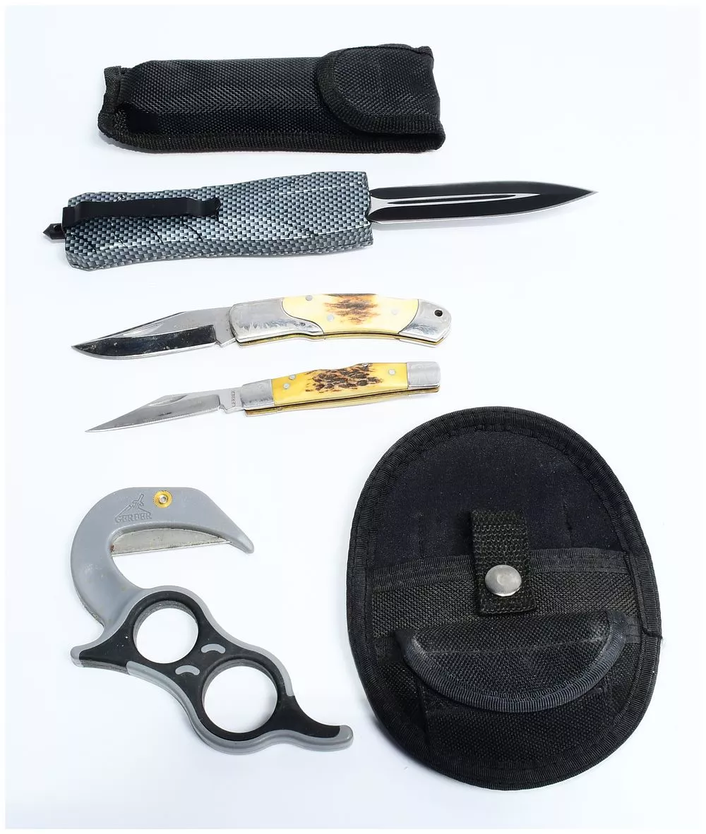 A Group of Cutting Tools and Handcuff Pouches