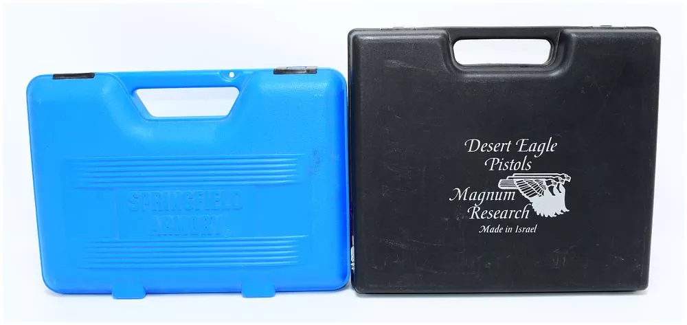 A Pair of Springfield Armory 1911-A1 and Magnum Research Desert Eagle Pistol Cases