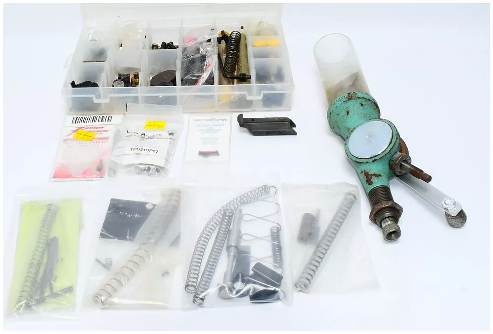 RCBS Uniflow Powder Measure and a Collection of Firearm Components and Sight Kits