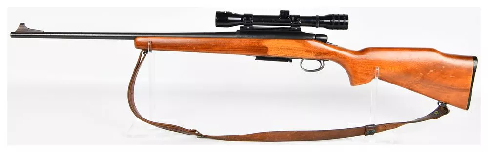Remington Model 788 Bolt-Action Rifle, .243 WIN, with Universal 4x32 Scope and Leather Sling