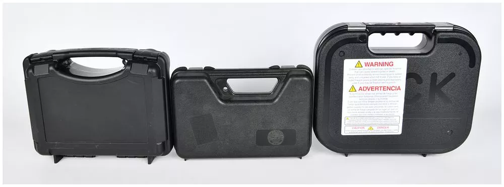Three Firearm Hard Cases, including Glock and Sig Sauer