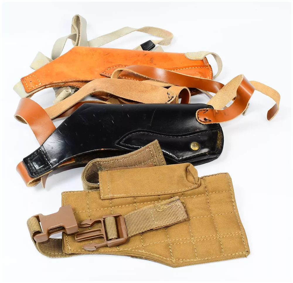 Three Holsters, including Vintage Hunter-Style Leather Shoulder Holsters and a Modern Tactical Holster