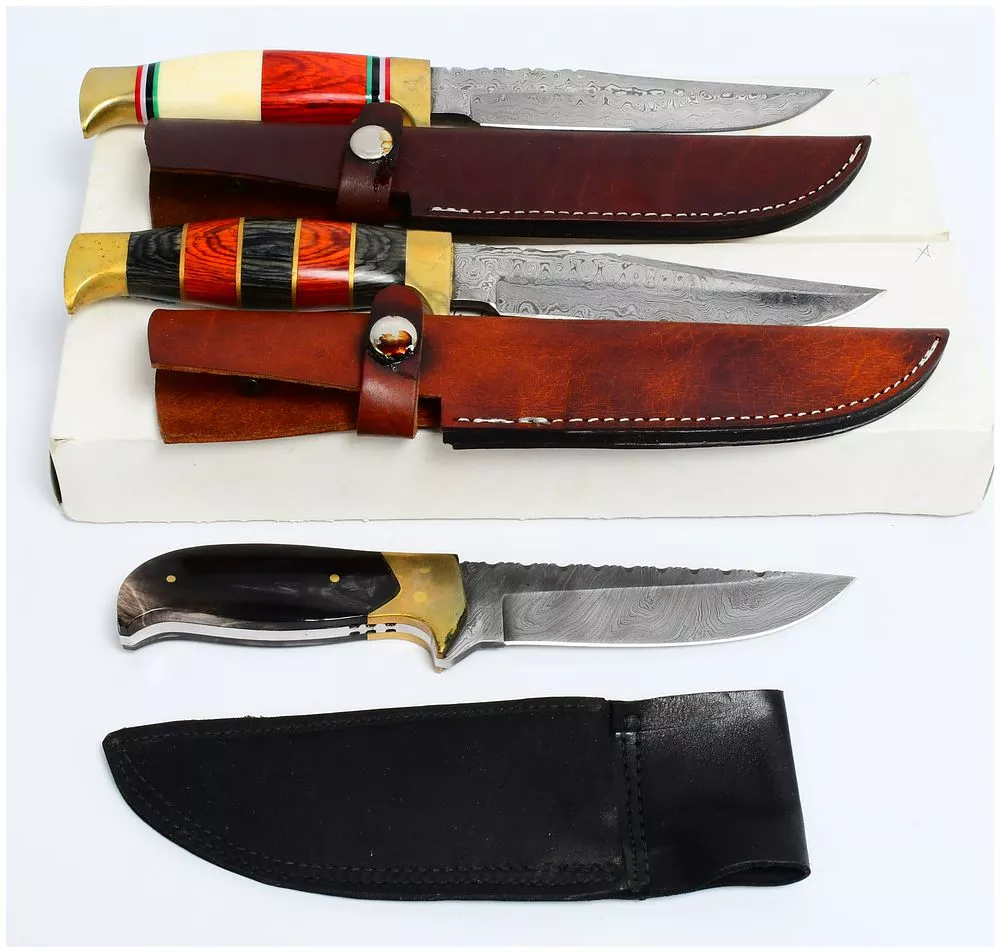 Three Modern Fixed-Blade Damascus Steel Hunting Knives with Segmented Wood and Horn Handles