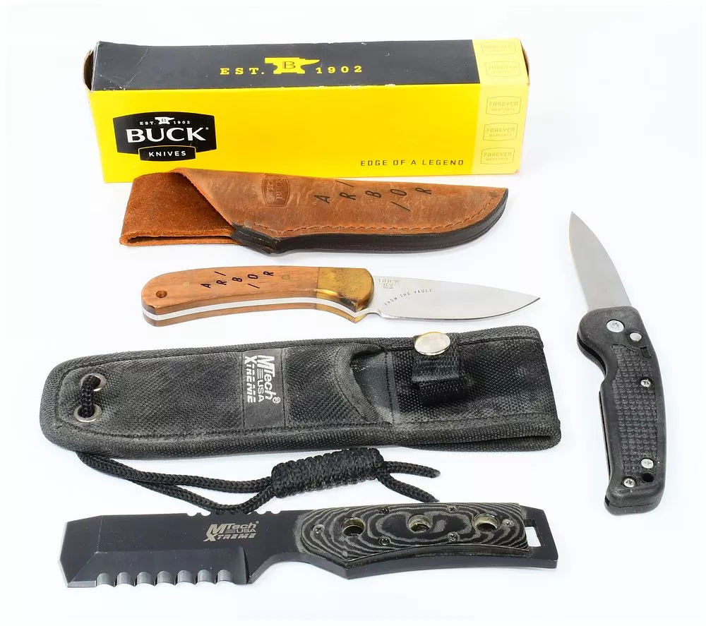 Three Modern Knives: A Buck "303 USA" Fixed Blade, MTech USA Xtreme, and a Folding Utility Knife